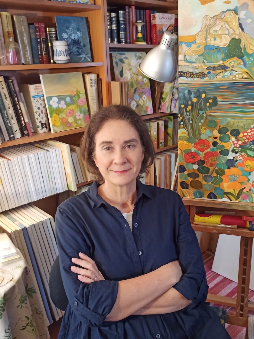 Angeles M Pomata in her studio, in front of the easel